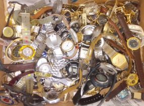 A box of assorted watch spares and repairs.