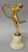 An Art Deco bronze finished spelter figure on alabaster base, height 27cm. Condition - various dings