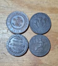 A group of four copper penny tokens comprising an 1812 birmingham and south wales, 1811 bristol