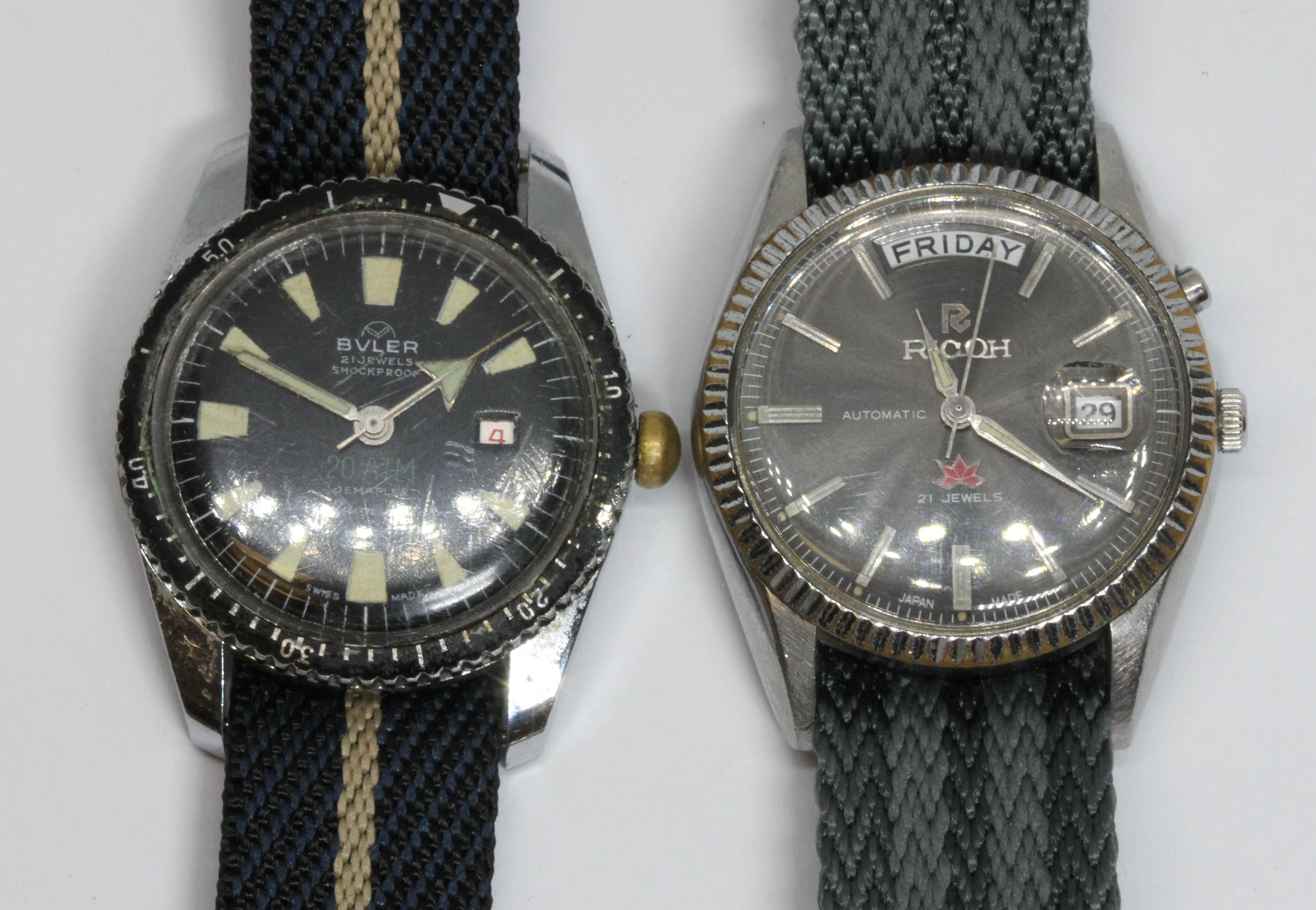 Two vintage wristwatches: Buler 21 jewel manual and a Ricoh automatic. Condition - both appear to