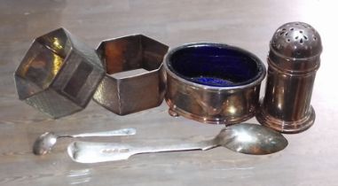 Hallmarked silver comprising a pair of serviette rings, a cruet set and a mustard spoon.