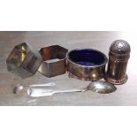 Hallmarked silver comprising a pair of serviette rings, a cruet set and a mustard spoon.