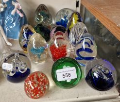 14 glass paperweights including Mdina