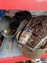 A copper coal scuttle, brass shovel and poker stand, brass jam pan and small rug