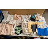 A box of vintage fashion comprising 1950s/60s under wear, nighties, stockings etc.