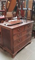 A George III mahogany chest of drawers, standing on ogee bracket feet, original handles.