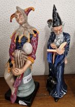 Two Royal Doulton figures: The Jester and The Wizard