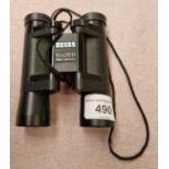 A pair of Zeiss 10x25B pocket binoculars.