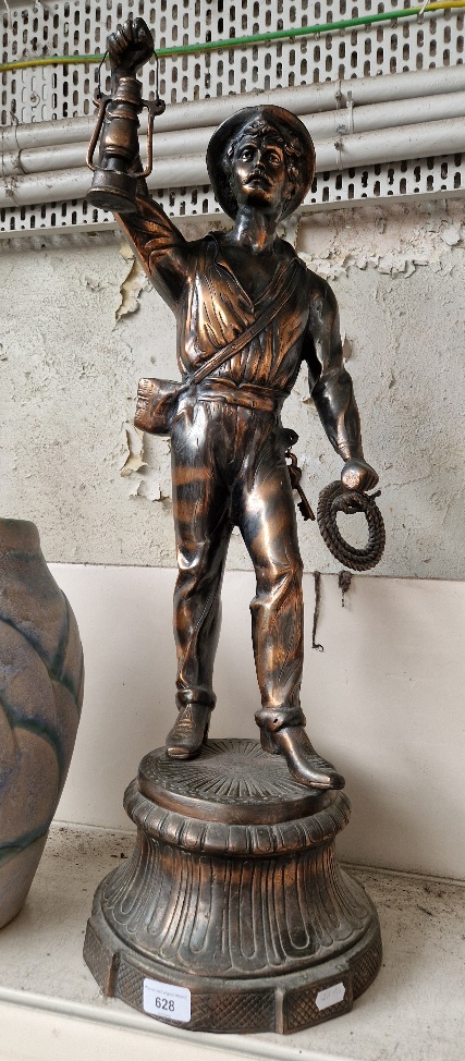 A French spelter figure model as a miner ,height 74cm.