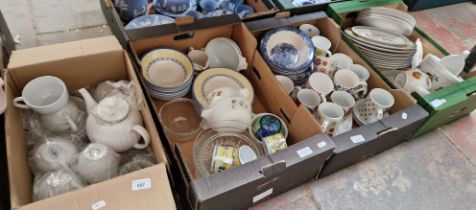 Four boxes of pottery