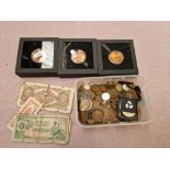 A box of assorted coins.
