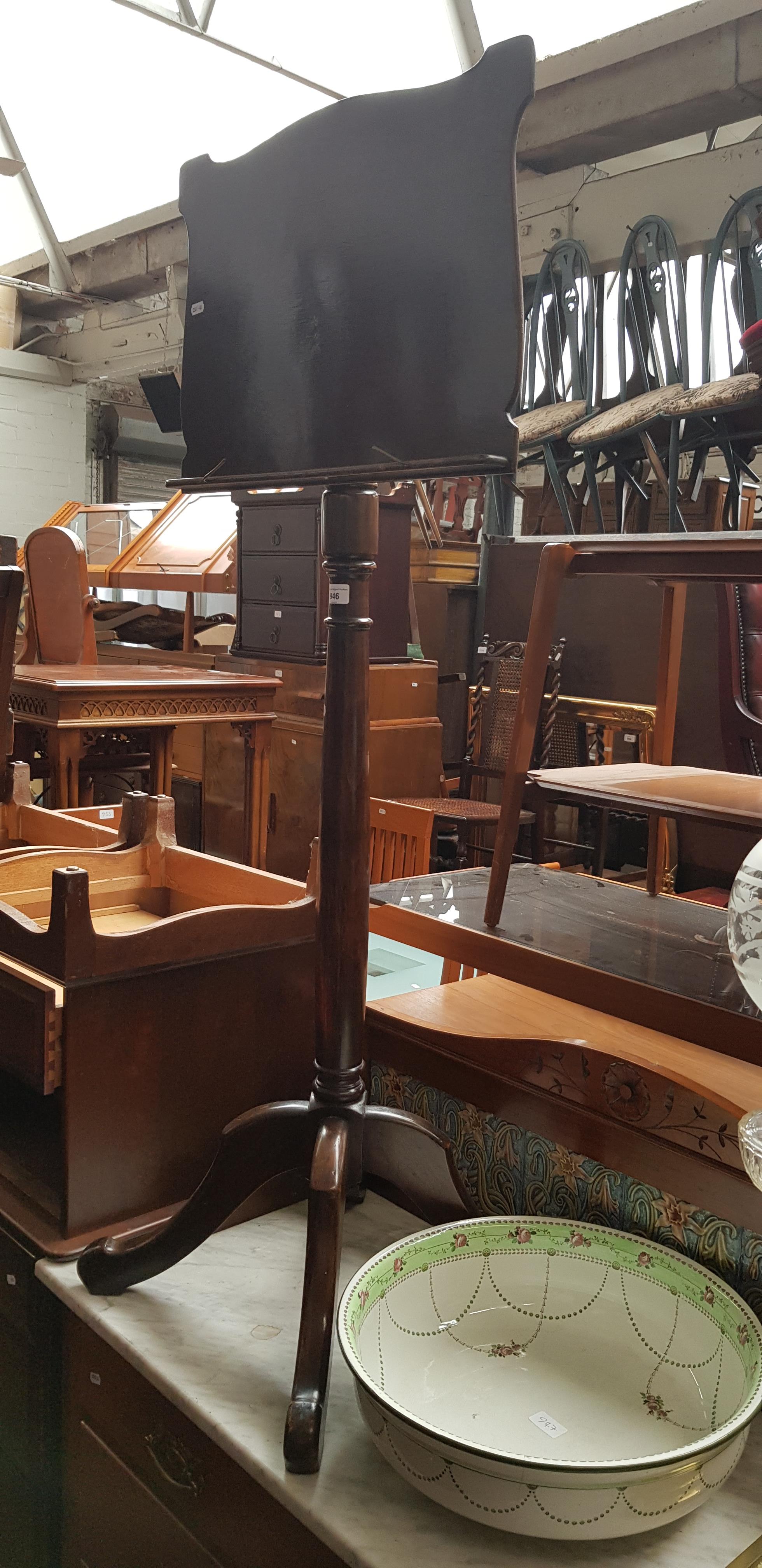 An adjustable music stand, circa 1900.