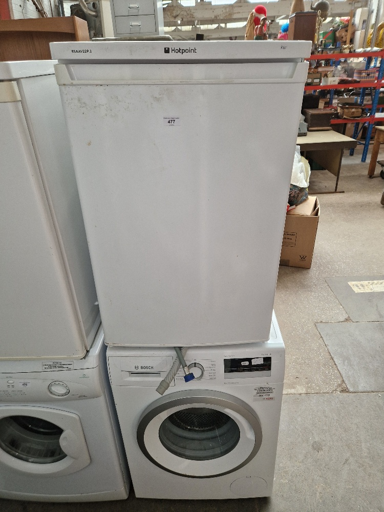 A Bosch washing machine and a Hotpoint freezer.