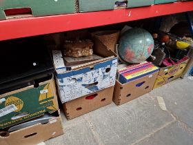 Four boxes of assorted household items including a terrestial globe, books electricals etc.