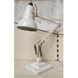 A Herbert Terry & Sons white Anglepoise lamp with two step base.