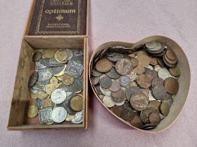 Two boxes of coins and tokens