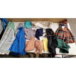 A box of 1960s/70s children's clothes.