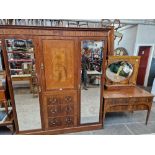 An Edwardian inlaid mahogany wardrobe & matching dressing table.