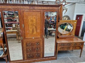 An Edwardian inlaid mahogany wardrobe & matching dressing table.