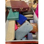 A box of antique, vintage and modern jewellery boxes.