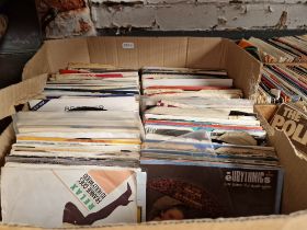 A box of mixed soul, rock & pop 7" vinyl singles.