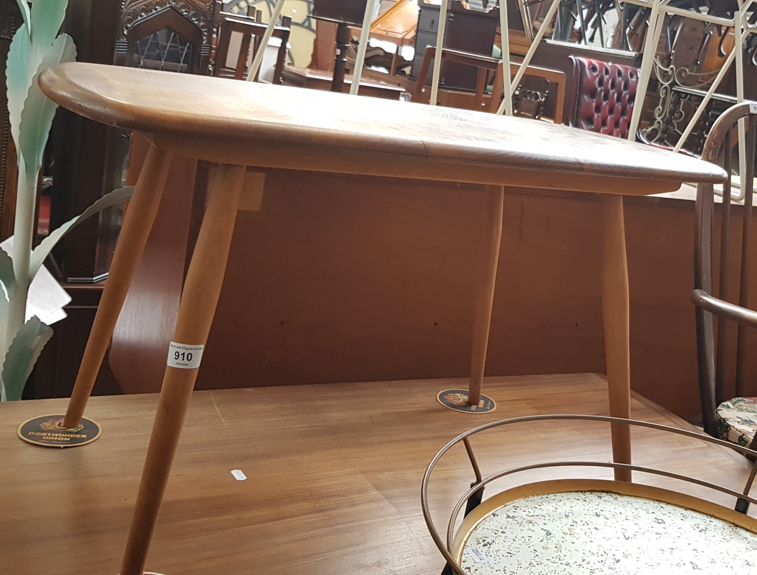 A mid 20th century Ercol light elm coffee table. Length 72.5cm