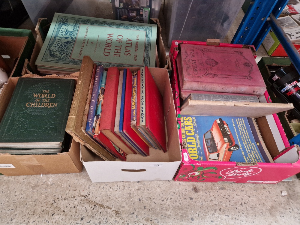 Four boxes of assorted books and magazines.