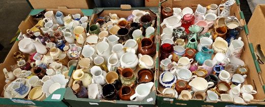 Three boxes of small jugs and ornaments