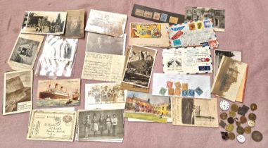 A mixed lot comprising old postcards, photos, stamps, watch movements and coins etc.