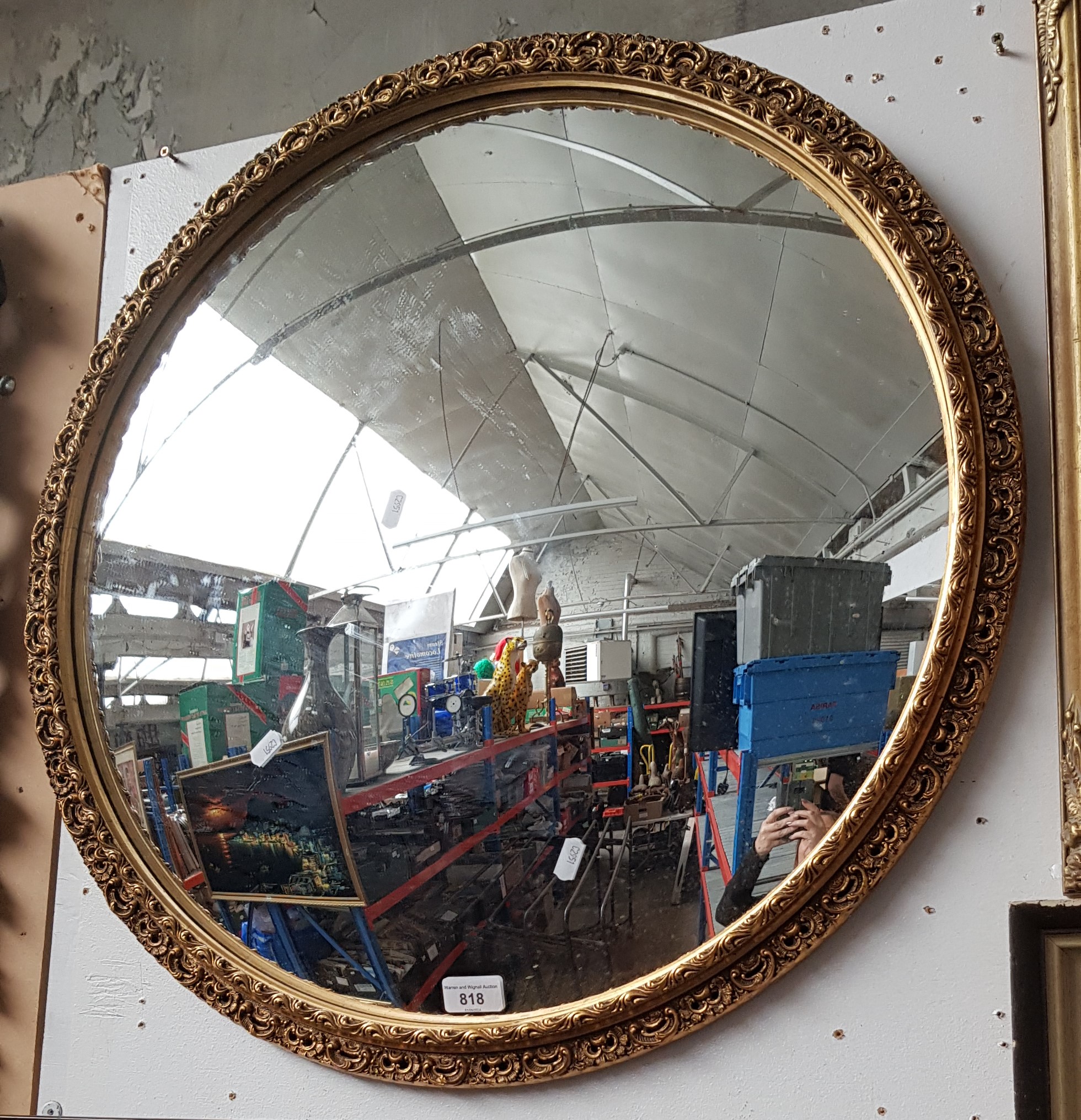 A vintage gilt framed convex mirror, 67.5cm diameter (overall).