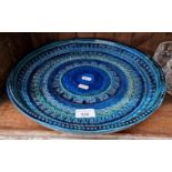 A 1960s Rimini blue pottery bowl, made in Italy by Aldo Londi for Bitossi, 35cm diameter x 6cm