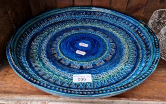 A 1960s Rimini blue pottery bowl, made in Italy by Aldo Londi for Bitossi, 35cm diameter x 6cm