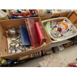 Two boxes of assorted items including a china posie, glass, plates, stamp albums and plated ware.