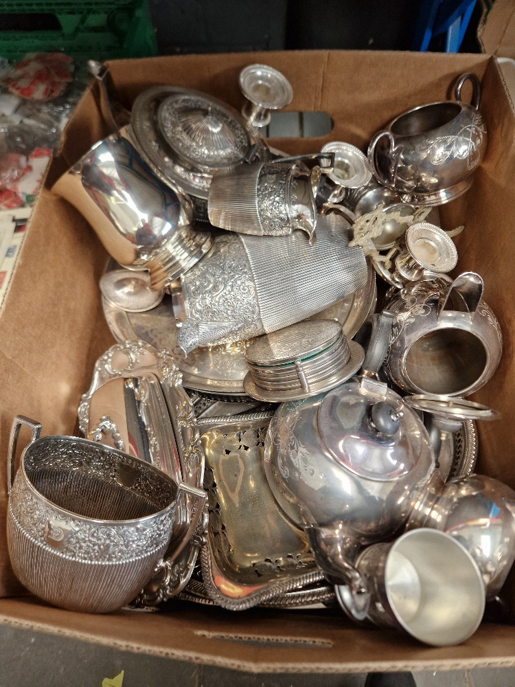 A box of silver plated ware