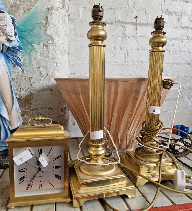 2 brass column table lamps, 1 shade, and a brass quartz clock