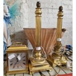 2 brass column table lamps, 1 shade, and a brass quartz clock