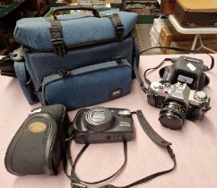 A Canon AV-1 slr camera and a Pentax camera etc