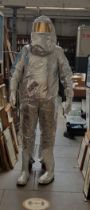 A 1988 aluminium heat protection suit by Isotemp Vorndamme consisting jacket, pants, gloves and