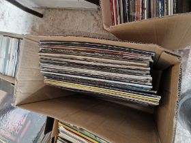 A box of soul, disco and dance 12" records.
