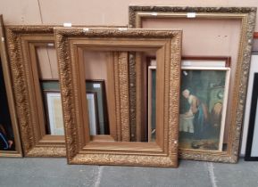 Three gilt picture frames together with four framed prints.