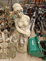 Stoneware garden figure modelled as a classical lady, approx. 47" high.