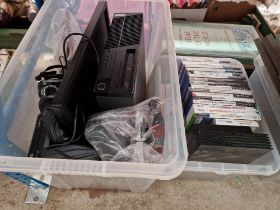 Two boxes of electronics including home PC and gaming accessories, PS2, Wii games, PC games,
