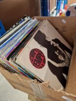 A box of DJ, dance and disco 12" vinyl records including promos and white labels.