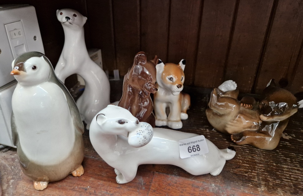 Six Russian ceramic animal ornaments.