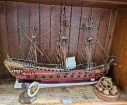 A model of a 4th Class Man-o-war c1690, made by W R Campbell, together with 2 nutcrackers in the