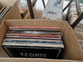 A box of soul, disco and dance 12" records.