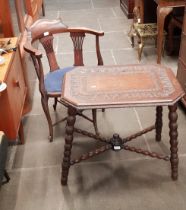 A corner chair and a bobbin leg tables.