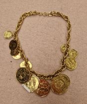 A vintage gold plated coin necklace.