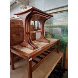 A mid 20th century G Plan teak nest of tables together with a teak and tile top coffee table.