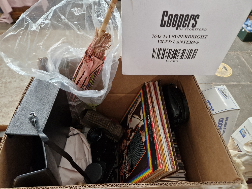 a box of assorted items including LPs and CDs etc.